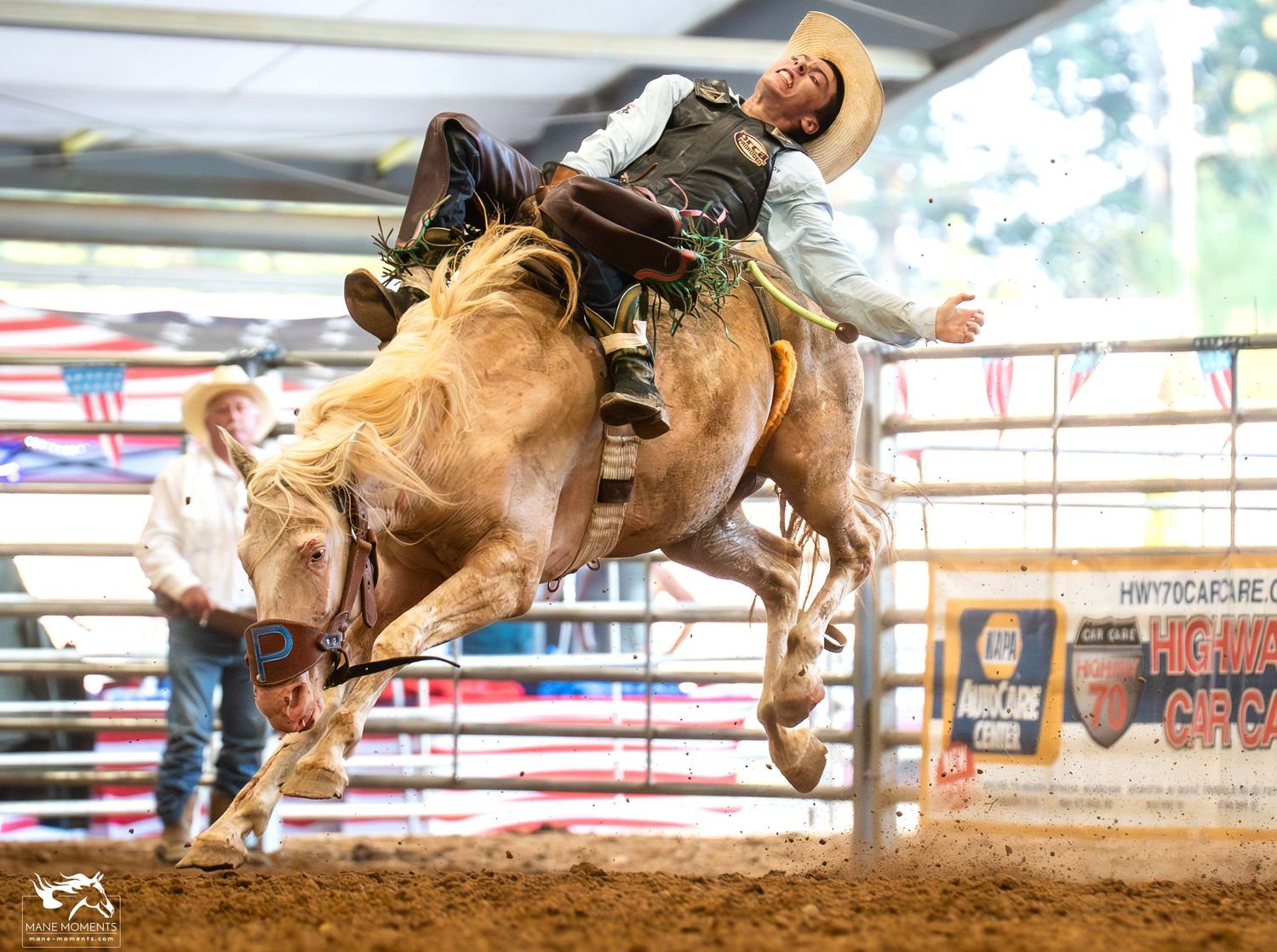 Dramatic sequence of a rodeo rider being thrown from a bucking bronco in a dusty arena during a competition.