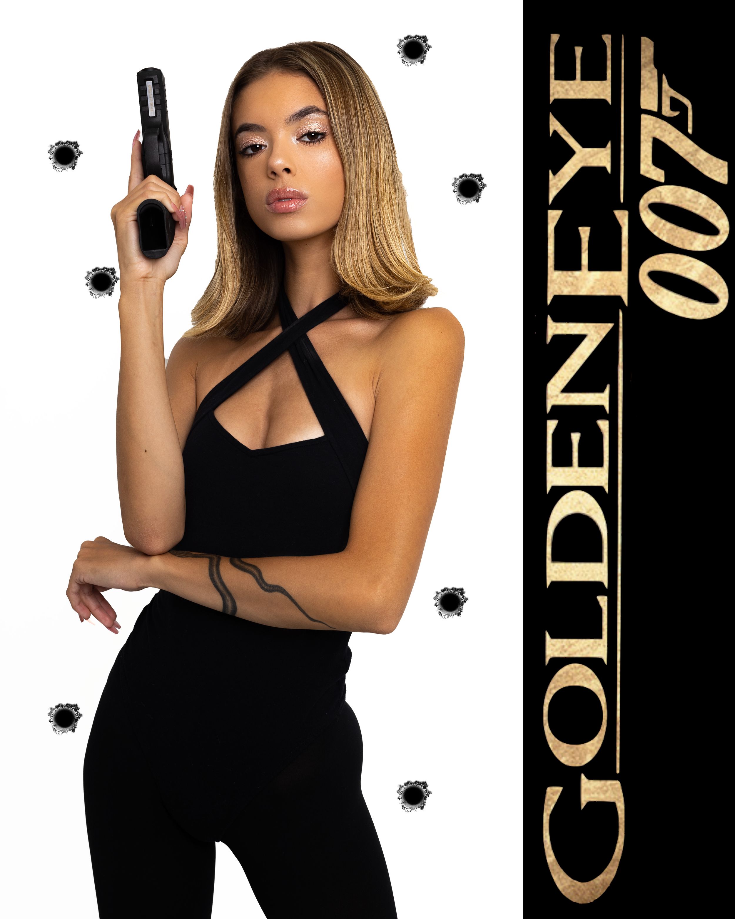 A figure in a black outfit poses with a handgun against a stylized background with bullet holes and gold text.