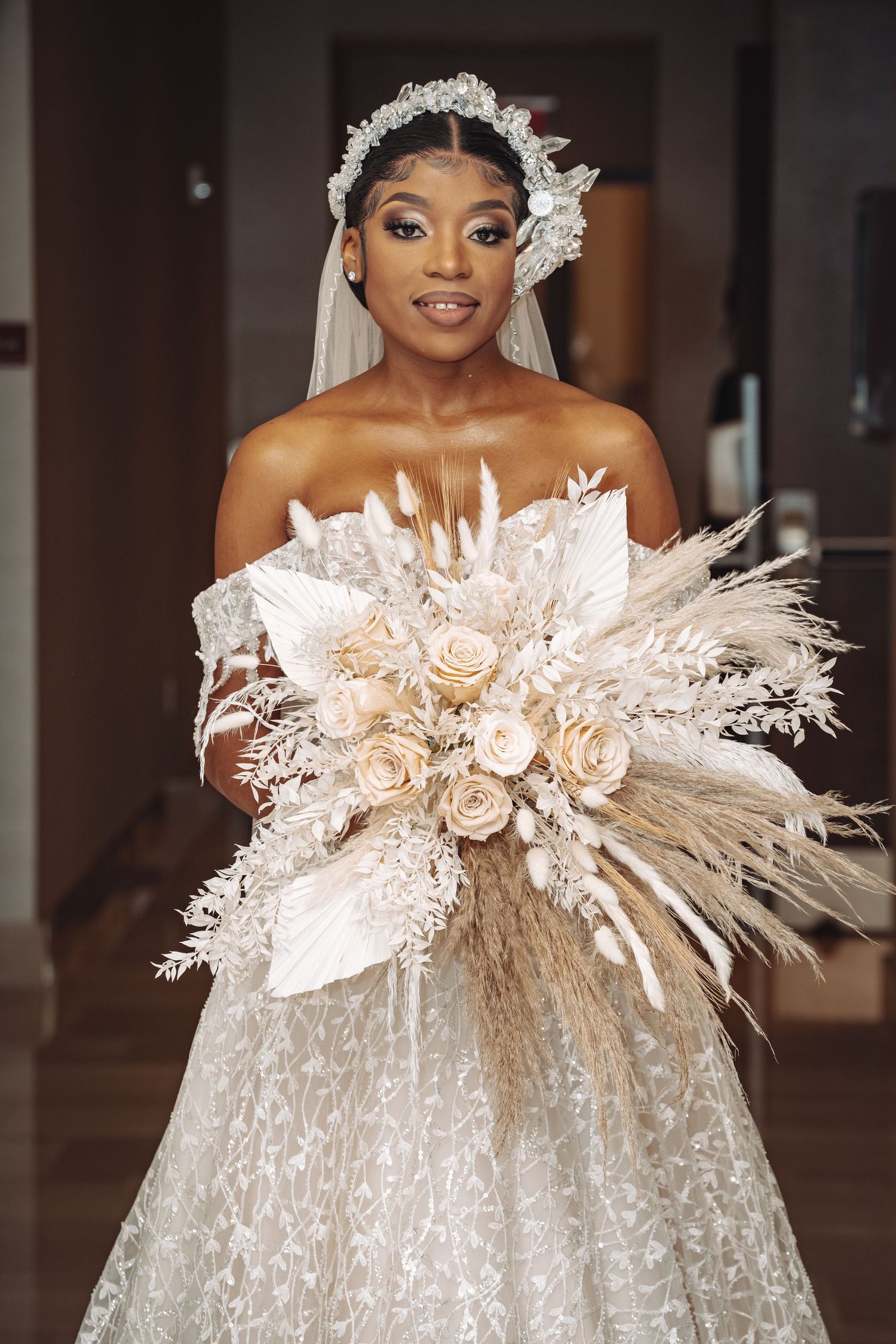 Stunning bridal portrait series showing detailed views of a luxurious white feathered wedding gown with crystal embellishments.