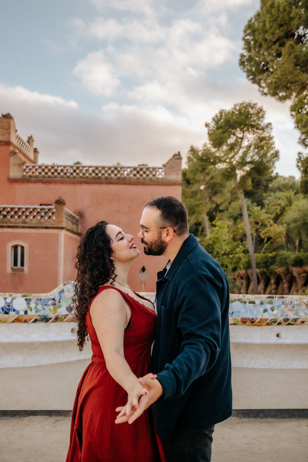 Joyful honeymoon moment captured with vibrant colors in Barcelona.