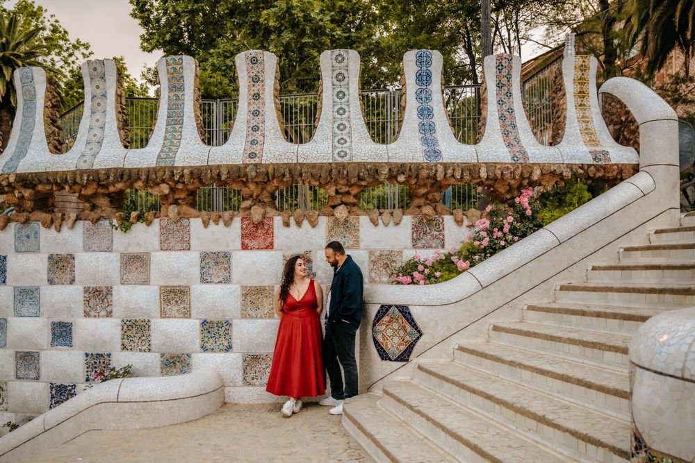 Tender embrace captured in the golden afternoon light of Park Güell.