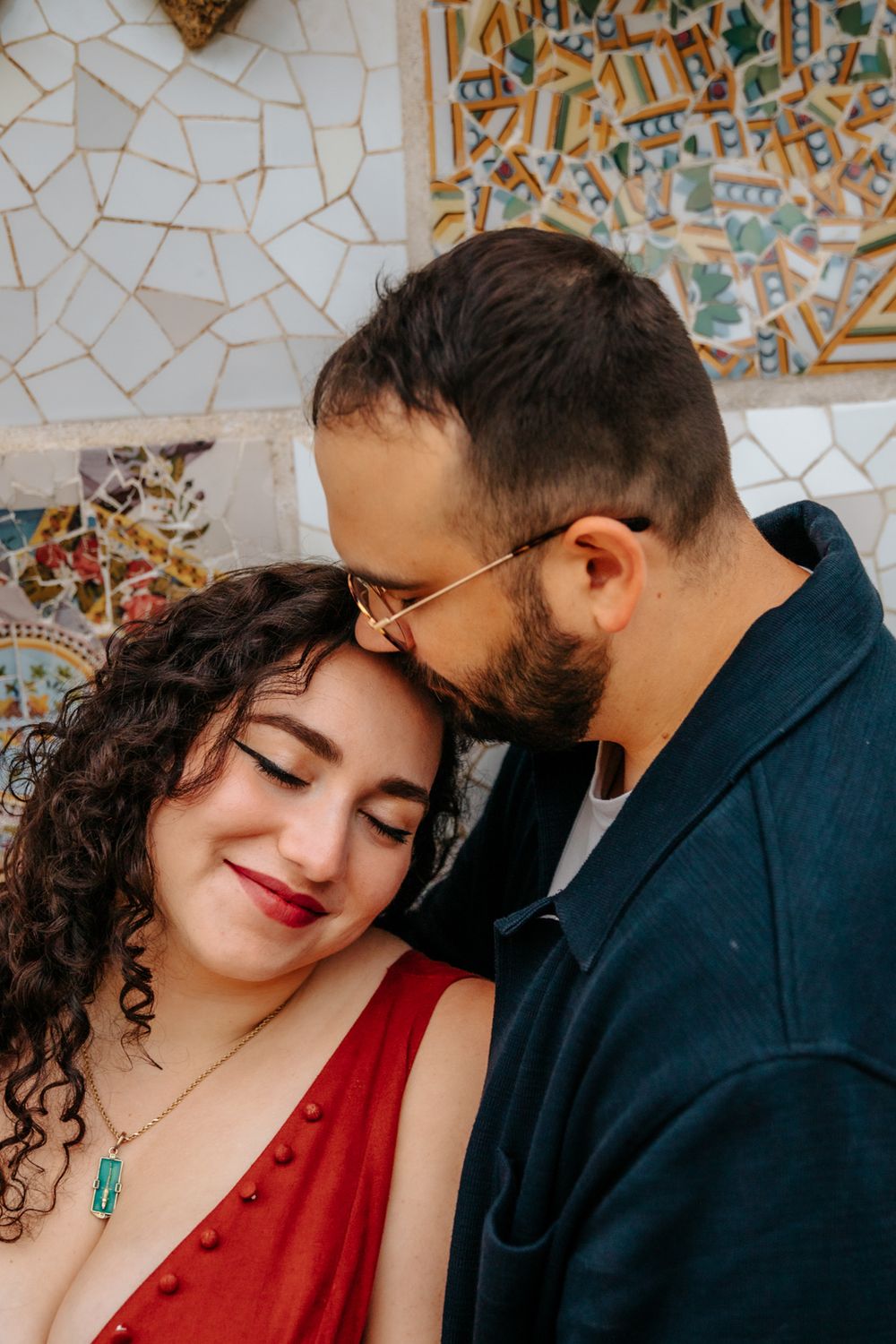 Gabrielle leaning into Anthony during their playful honeymoon session.