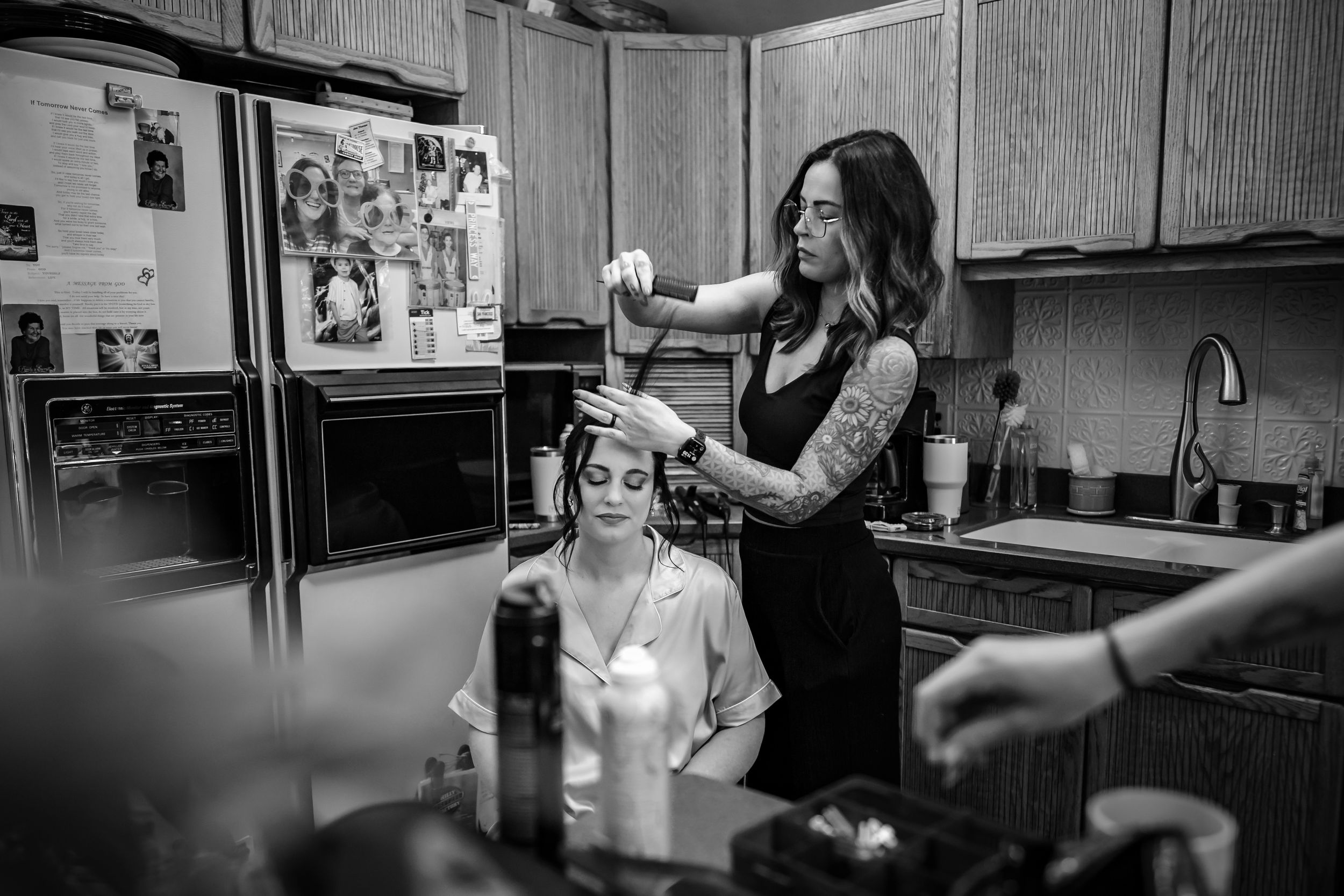 Black and white candid shots of wedding preparation moments.