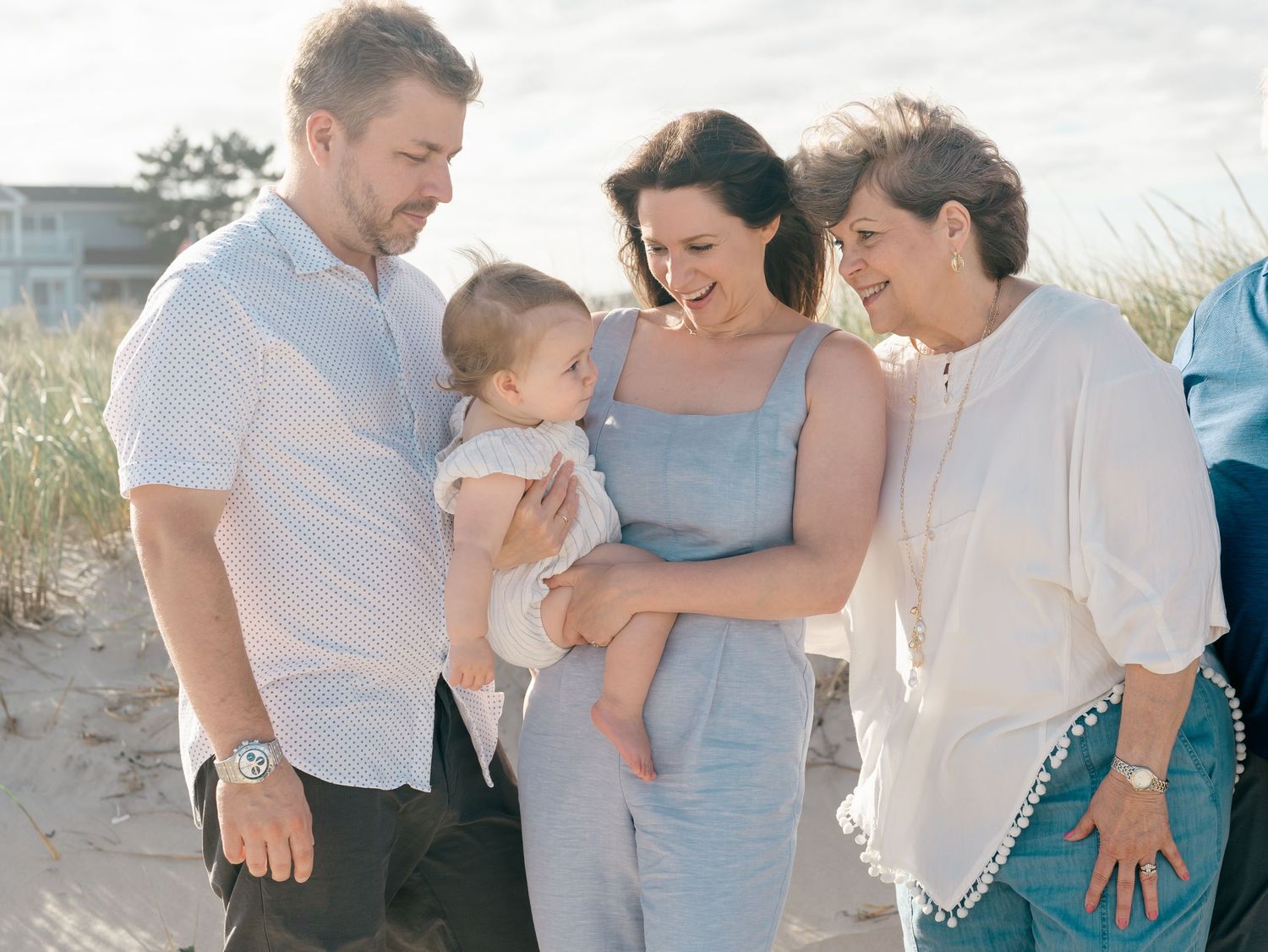 Grandparents with grandchildren smiling during extended family photos in Monmouth County NJ.