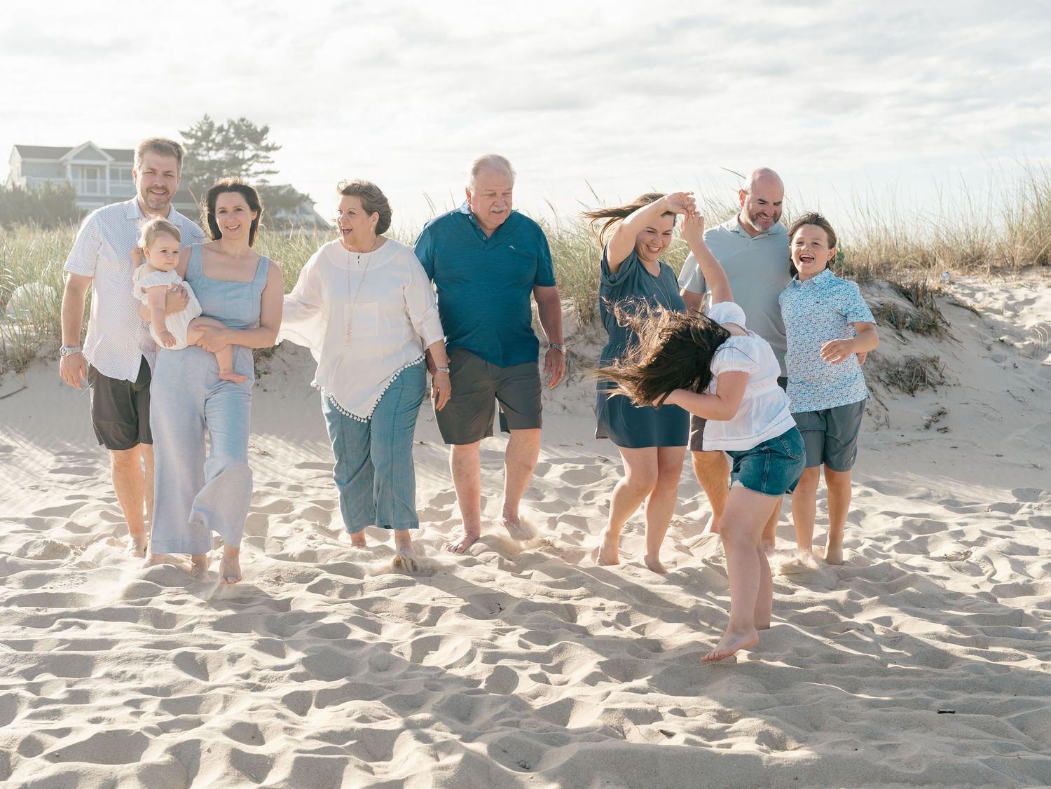 Relaxed candid extended family portraits on the Jersey Shore in Spring Lake NJ.