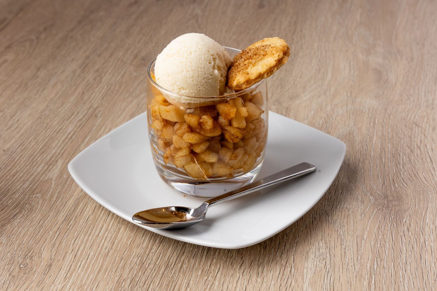 Assorted desserts and puddings served in elegant white dishes and glasses.