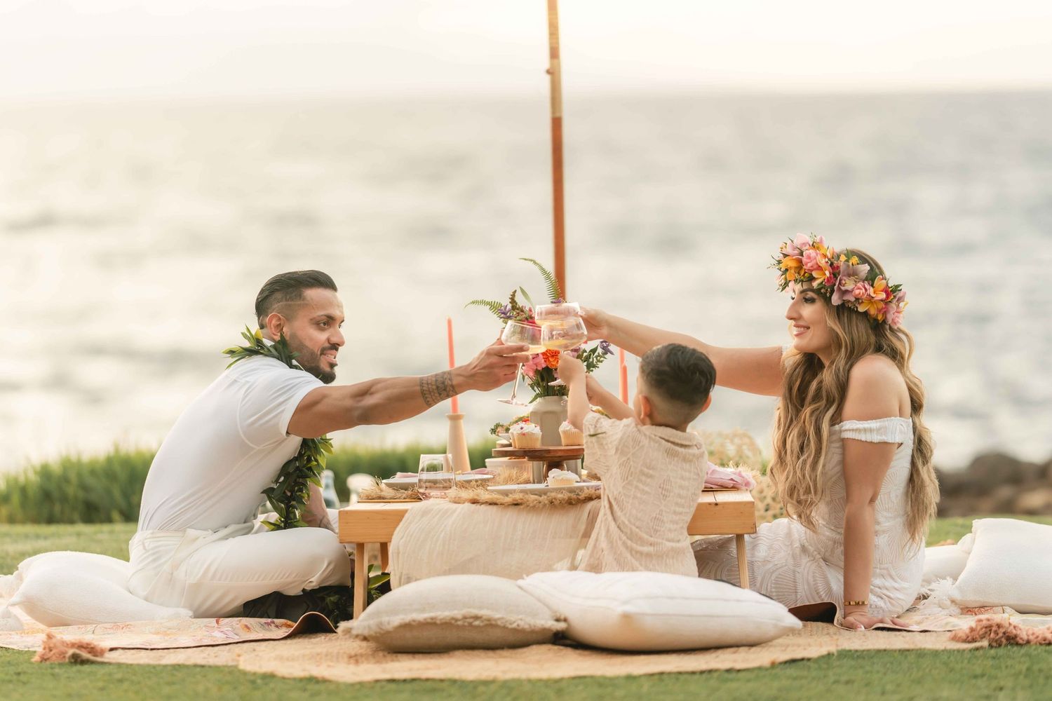 Maui wedding photographer photo against beautiful Maui sunset beach by ohwowfotos.