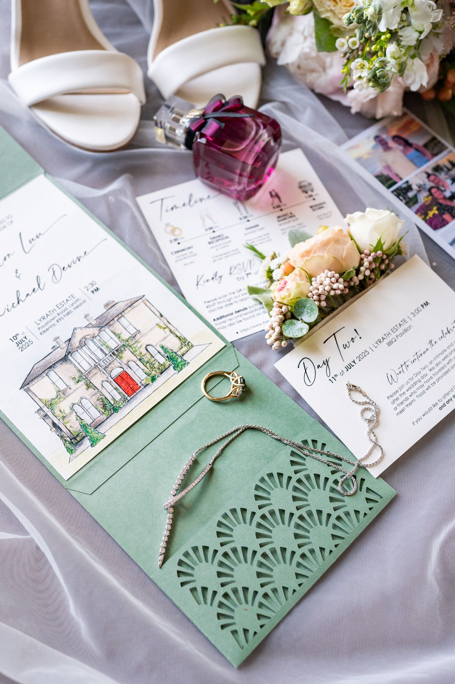Wedding invitation suite with green details and watercolor venue illustrations on silk fabric.