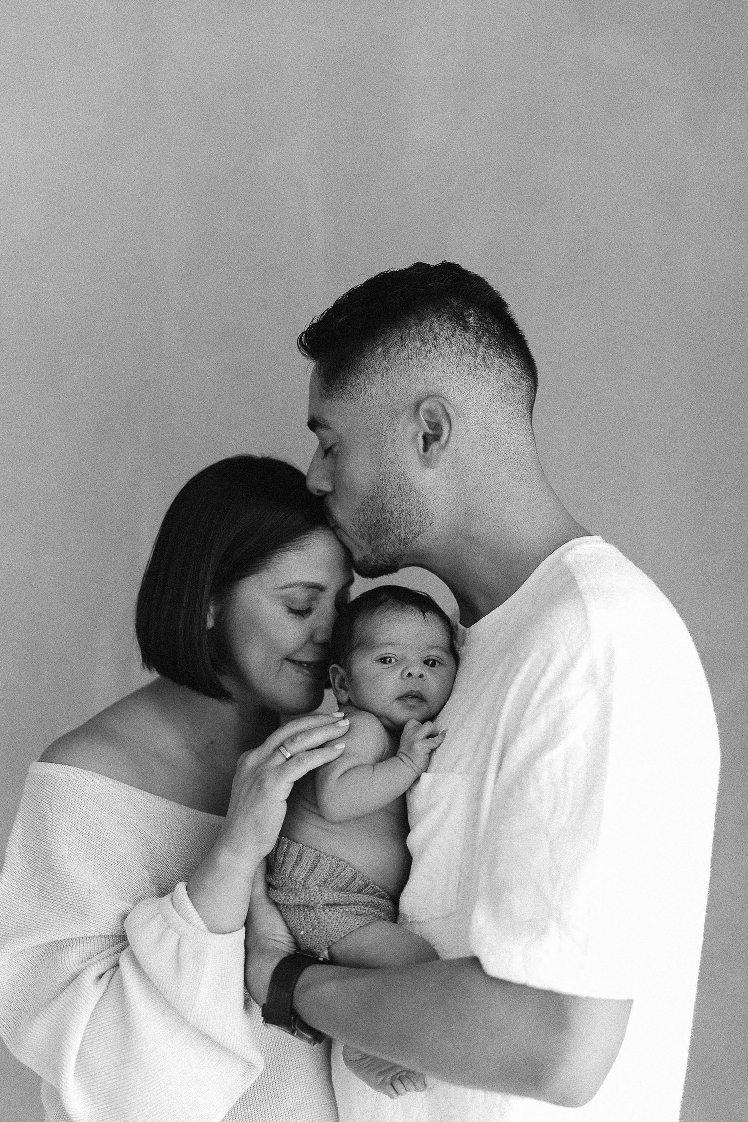 Cozy newborn family photoshoot at Spark Studios Huntington Beach