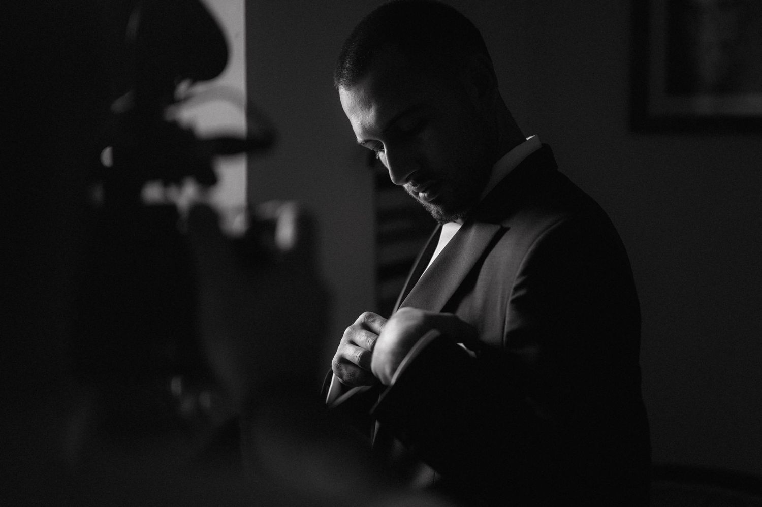 Seven black and white photos show silhouettes and dramatic shadows in moody noir-style compositions.
