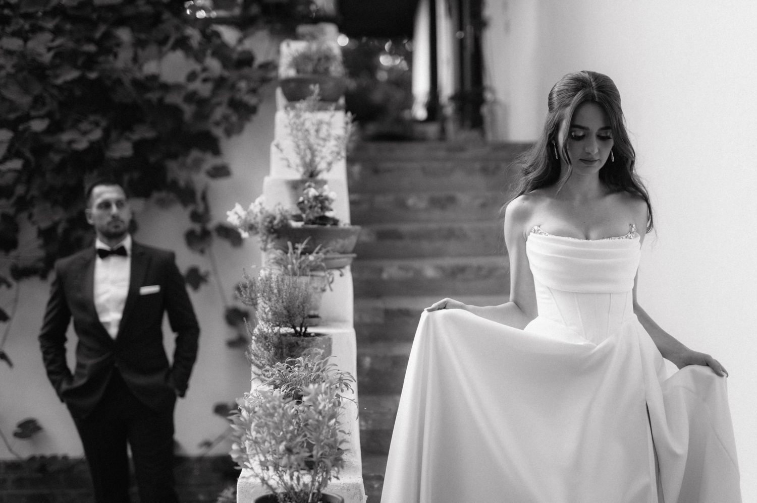 Romantic black and white collage of wedding moments featuring elegant bridal gown details and couples in formal attire.