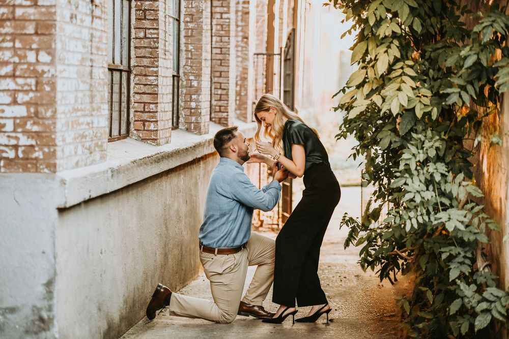 Engaged couple strolling towards romantic dinner after proposal