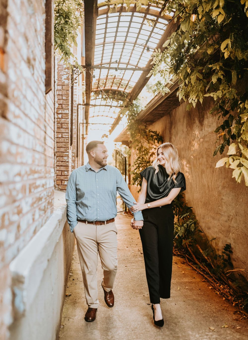 Sunset glow over engaged couple at Cotton Mill proposal photoshoot