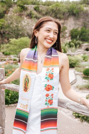 A series of candid shots showing traditional Mexican serape with floral embroidery and Guadalupe design against natural scenery.
