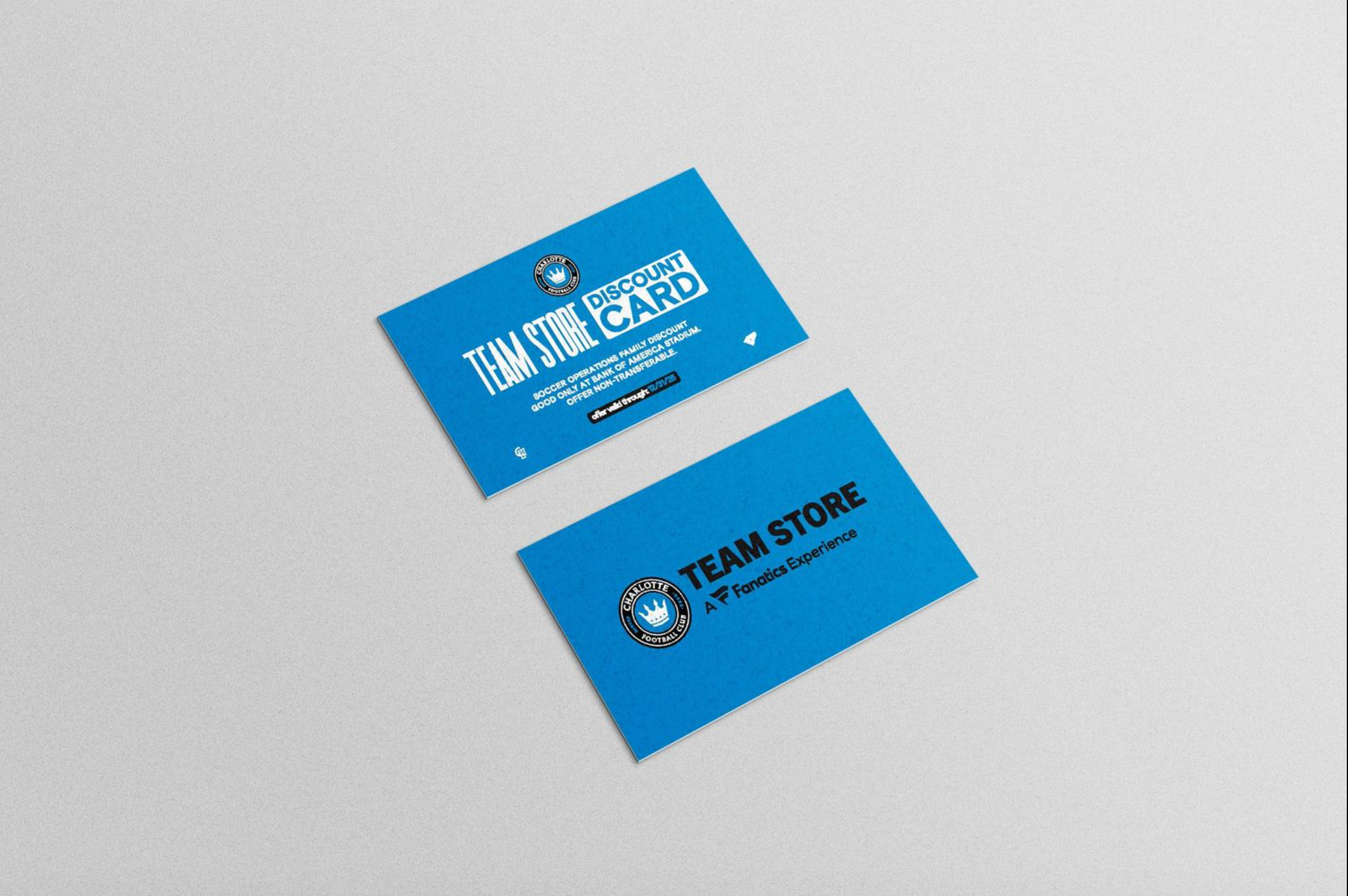 Charlotte FC Team Store loyalty card mockup displayed on blue business card design with crown logo.