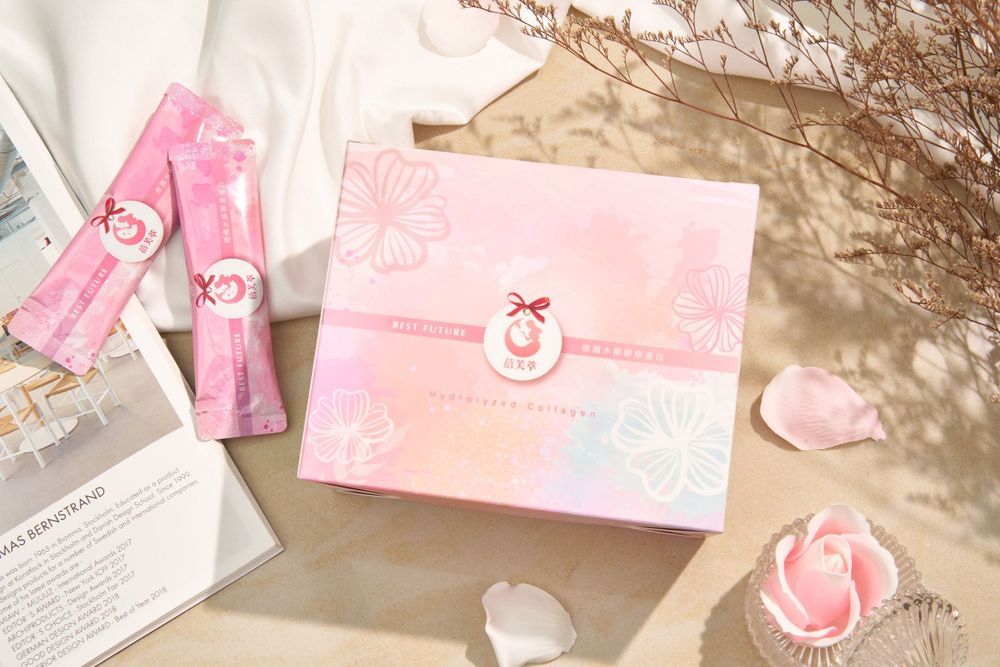 Collection of pink stationery items and paper products arranged in a flat lay composition.