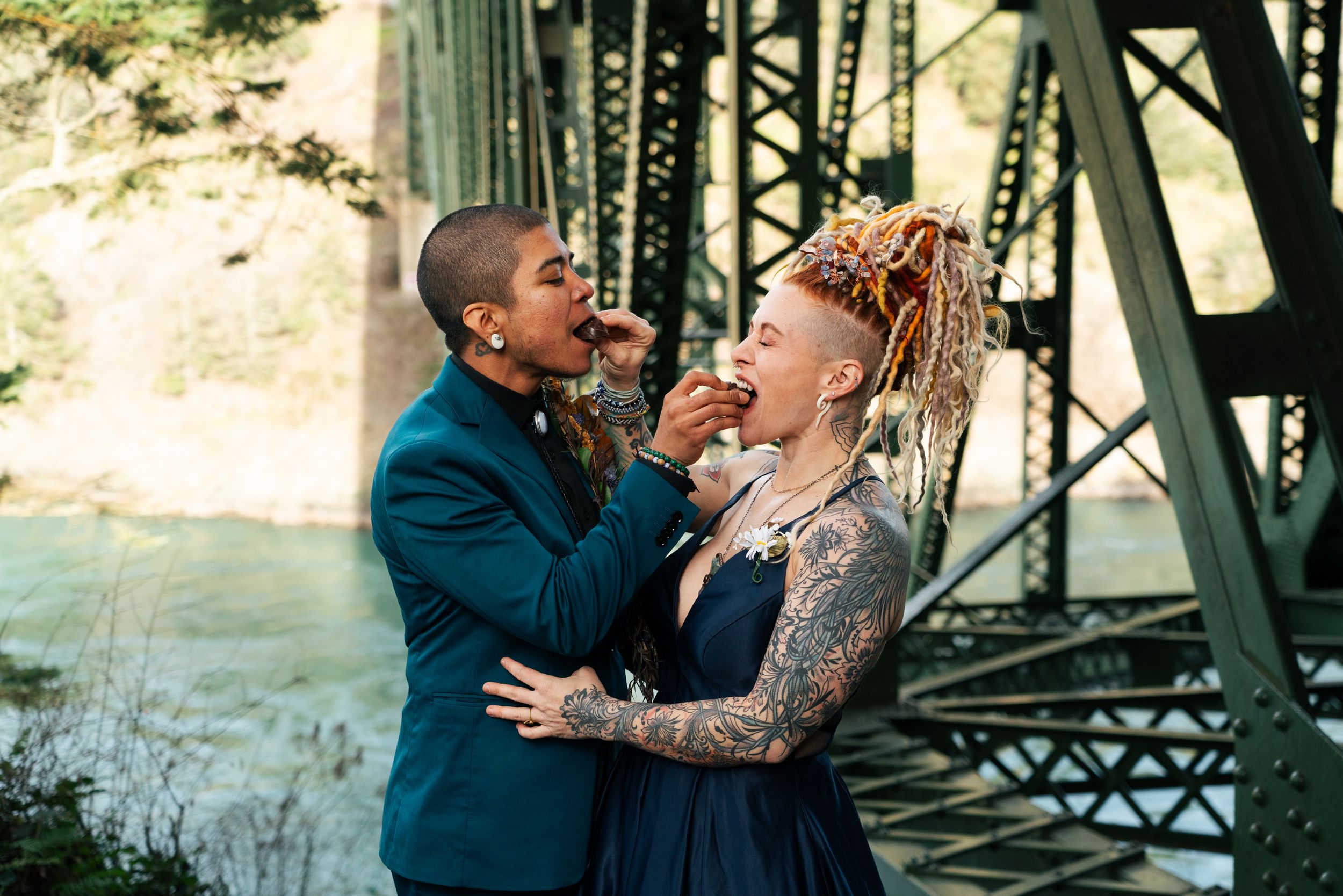 A couple shares intimate moments during a romantic elopement photoshoot at Deception Pass State Park, captured by Savvy Photography