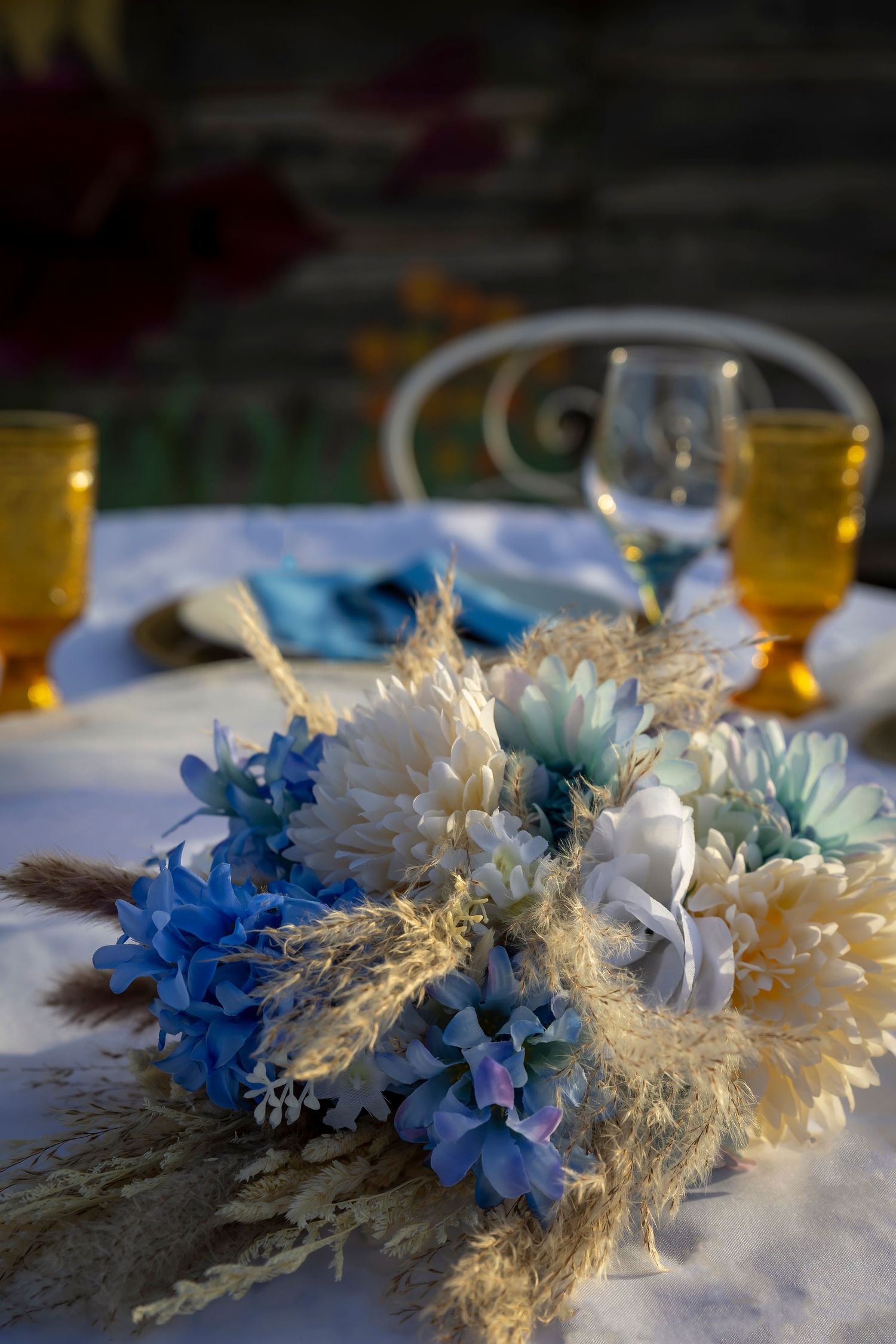 wedding couples table with bridal bouquet