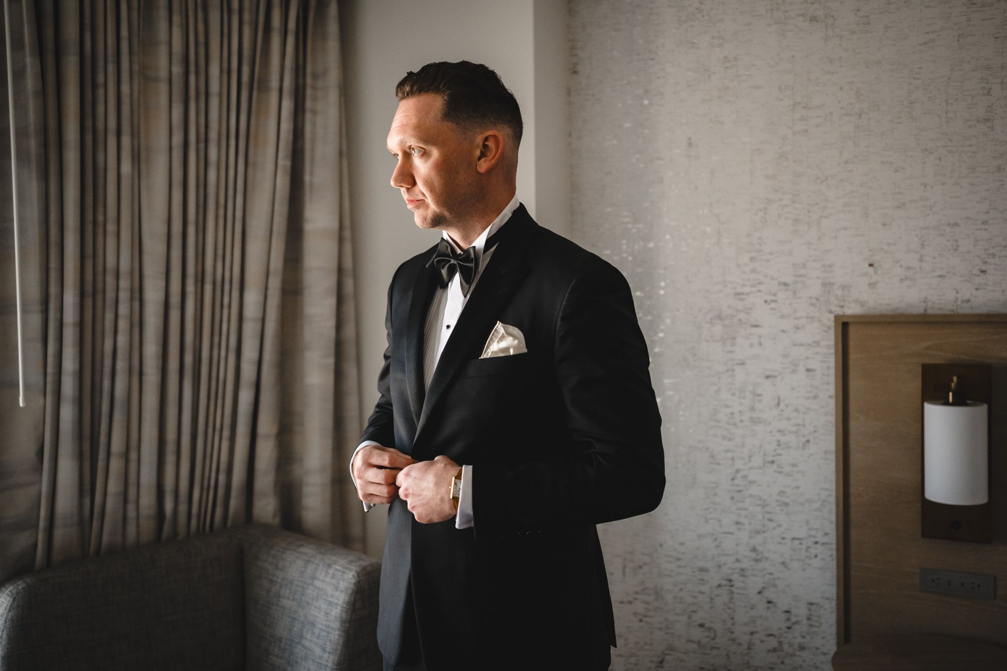 A series of candid moments captured in a hotel room with people in formal attire.