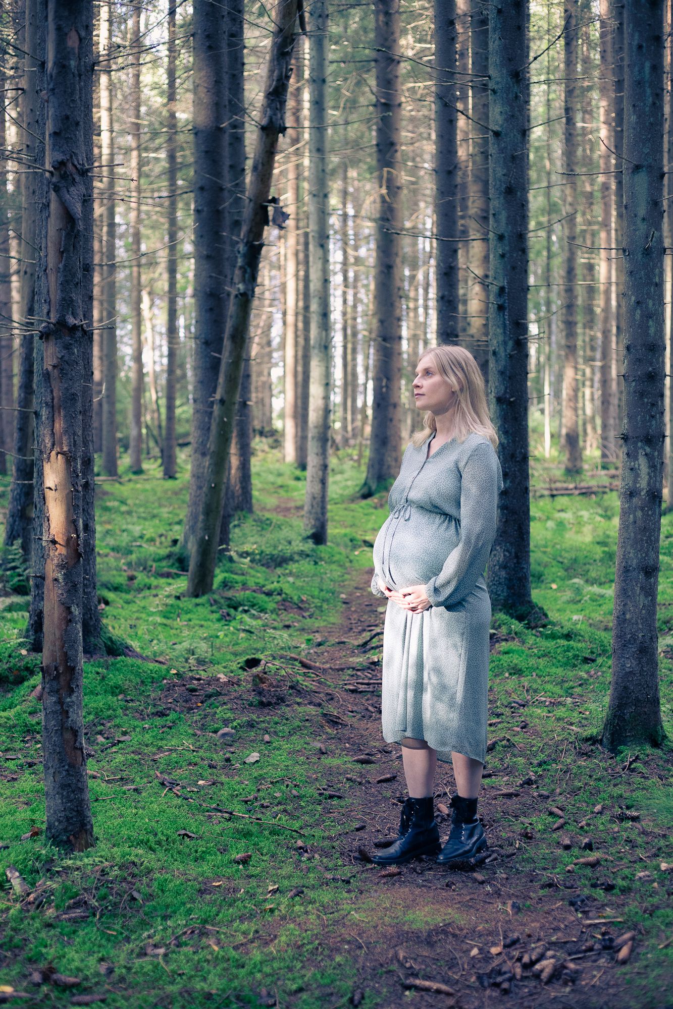A pregnancy photo in a forest