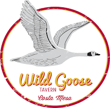 Vintage-style circular logo design featuring a flying wild goose with 'Wild Goose Tavern' text in retro typography.