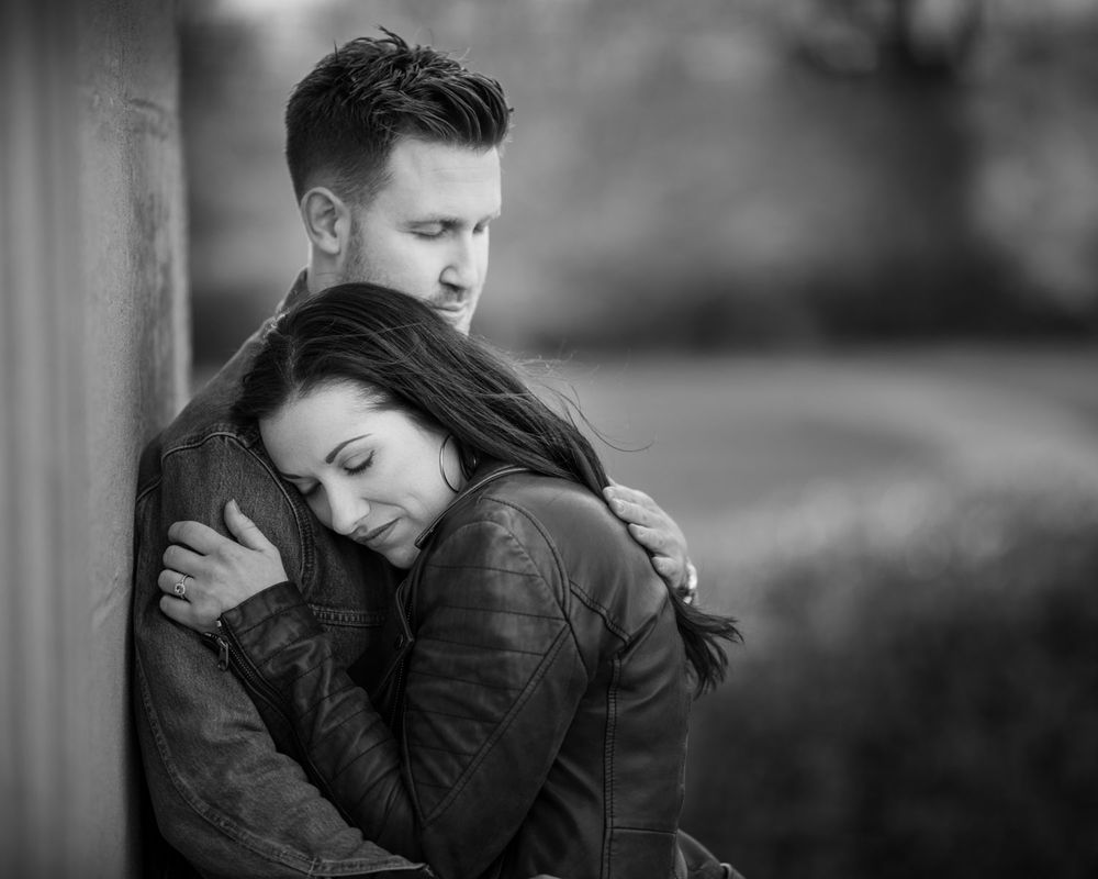 Romantic couple having a moment in historic garden
