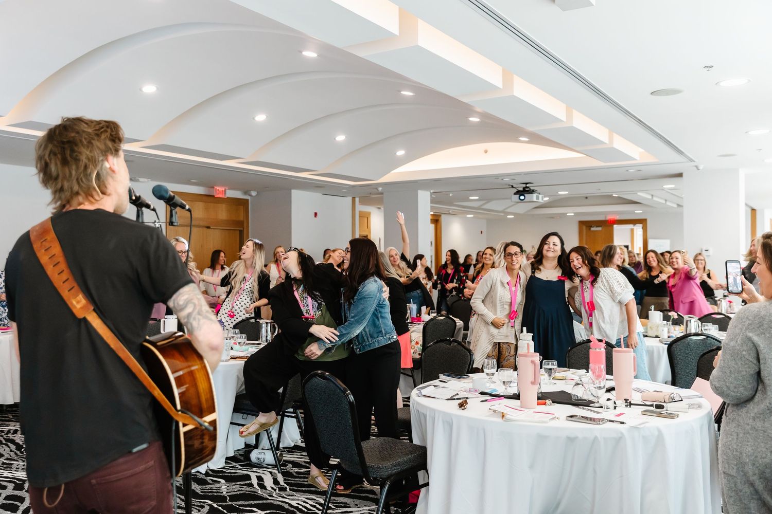 Candid group photo at a women's retreat in Osoyoos BC at the Build Your Brave Retreat during a performance