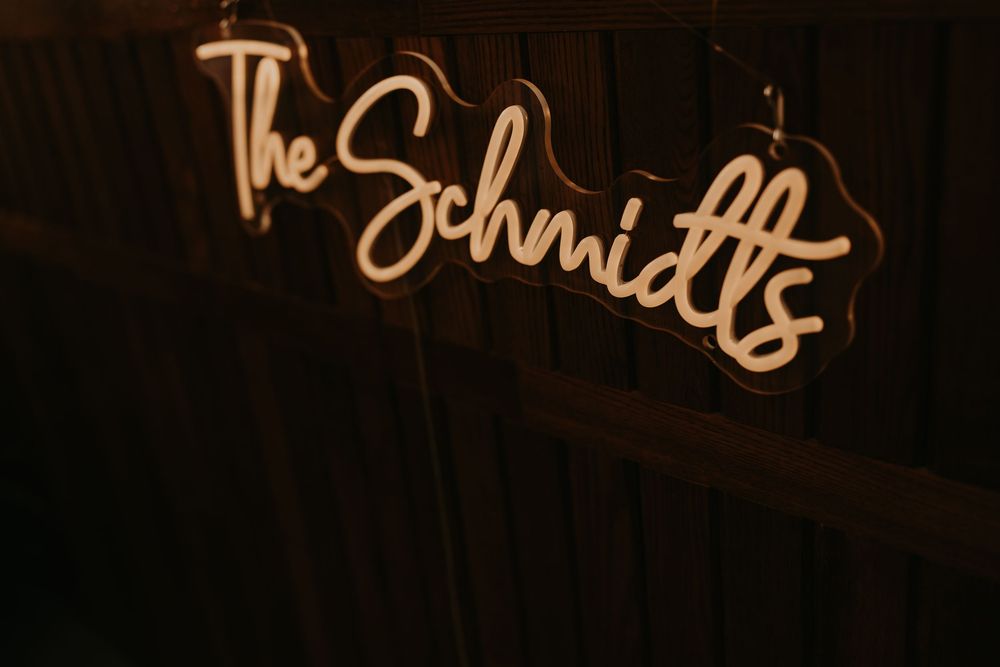 neon sign featuring the wedding couple's last name