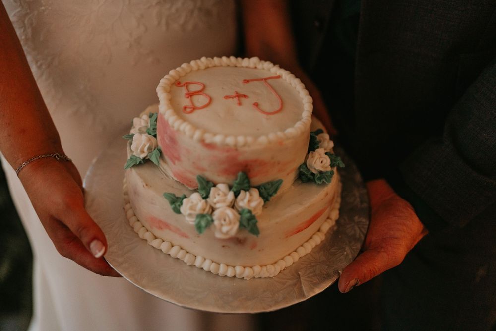 close up of wedding cake with their initials