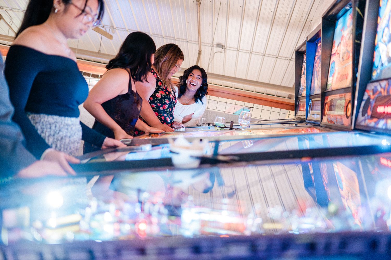 friends playing arcade games