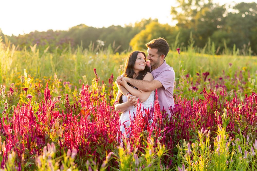 Romantic sunset photoshoot in a field of bright red celosia flowers at the Flower Lady and Gent