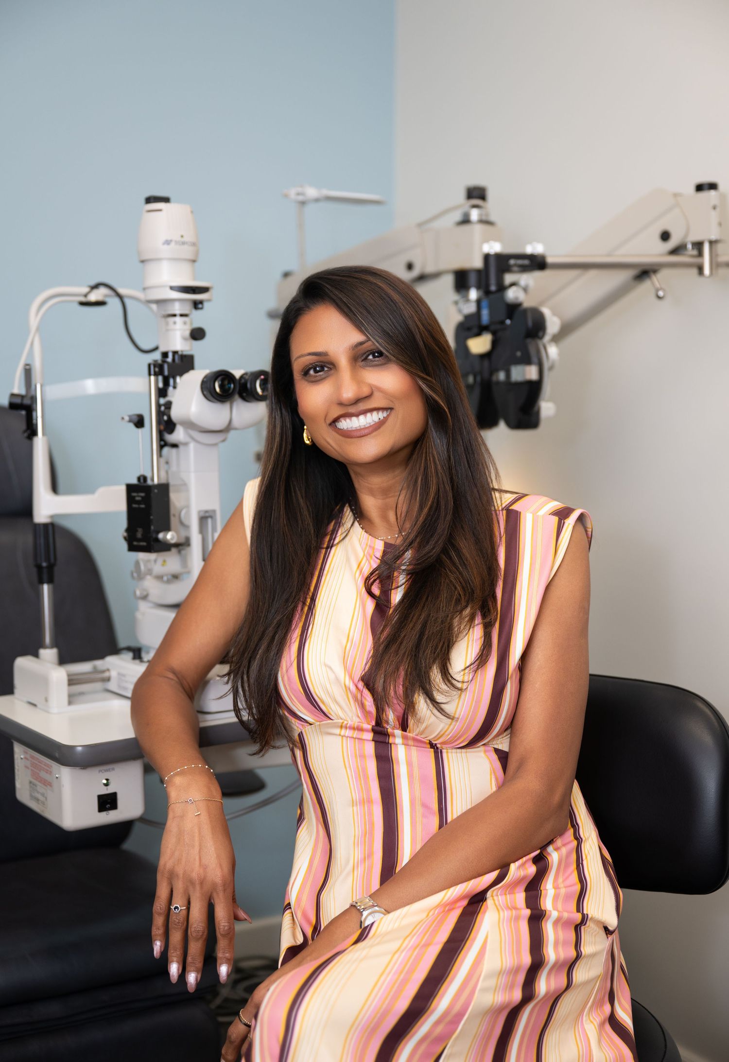 Professional portrait series showing a person in a white lab coat and beige top against a light background.