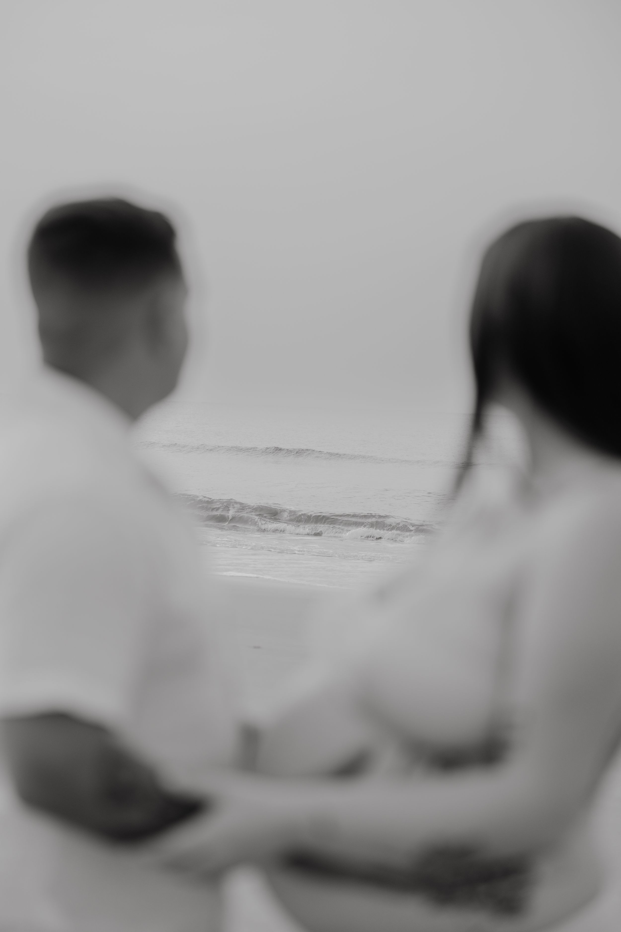 Artistic black and white silhouettes showing tender interactions between figures.