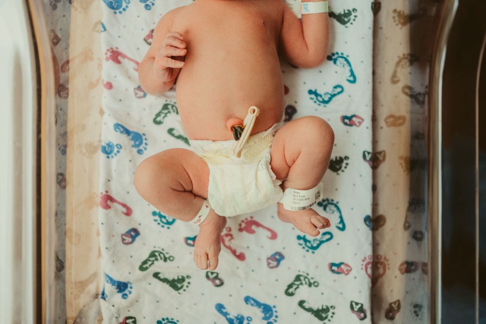 Fresh 48 session by Dayton, Ohio based newborn photographer Disney Magic Photography, serving Beavercreek, Bellbrook, Kettering and more