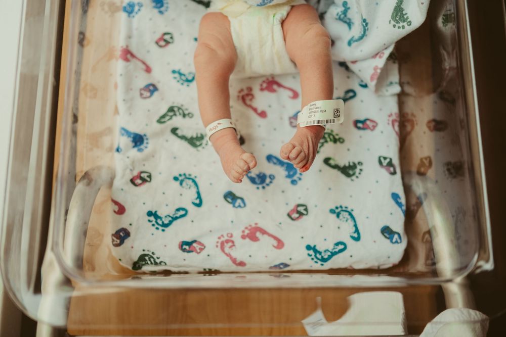 Fresh 48 session by Dayton, Ohio based newborn photographer Disney Magic Photography, serving Beavercreek, Bellbrook, Kettering and more
