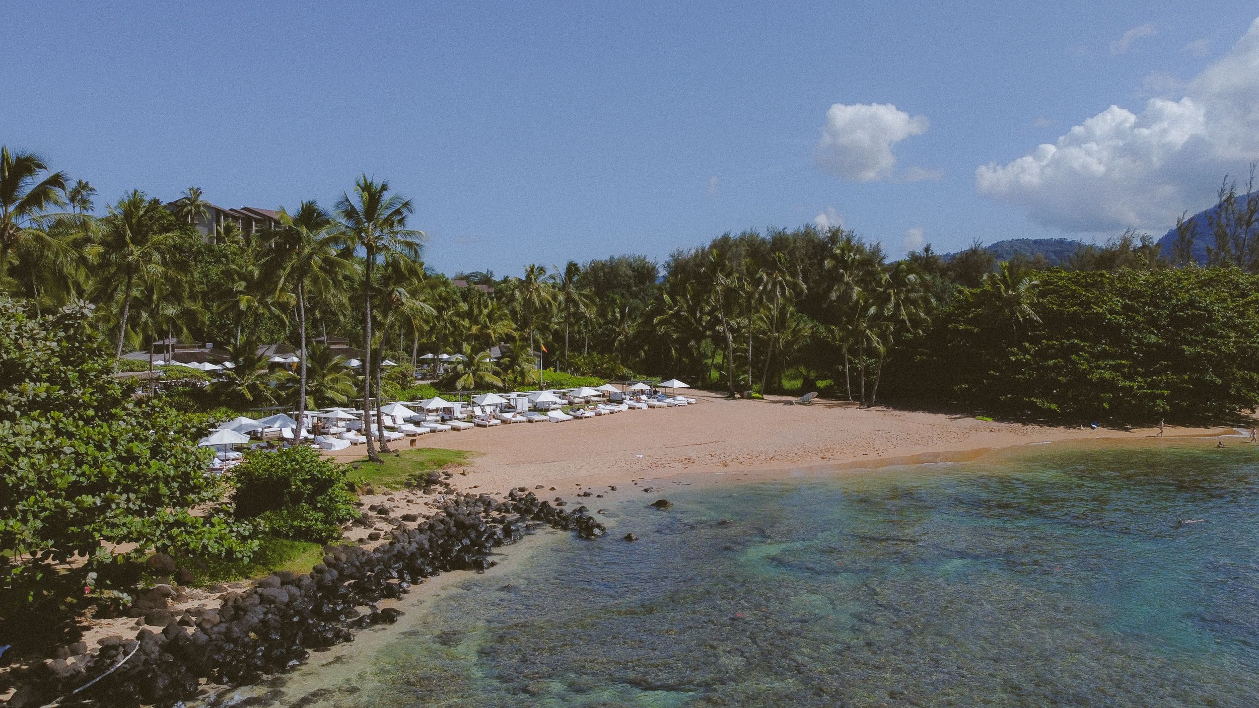 Sunset at Kauai wedding with drone footage of ceremony by Kauai Wedding Photographer