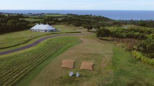 Sunset at Kauai wedding with drone footage of ceremony by Kauai Wedding Photographer
