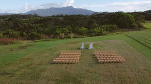 Sunset at Kauai wedding with drone footage of ceremony by Kauai Wedding Photographer