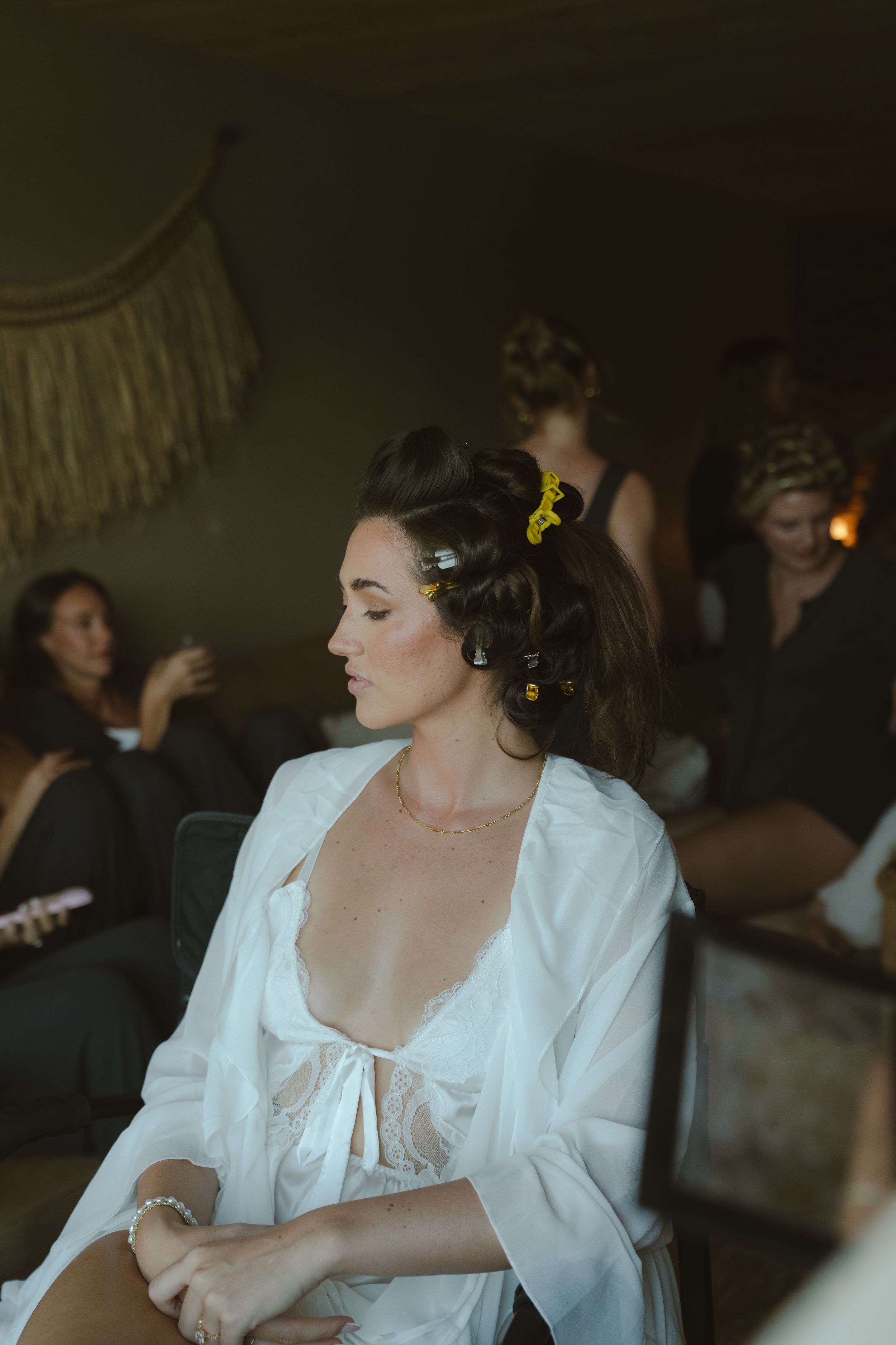 bride getting ready for kauai wedding by Kauai Wedding Photographer