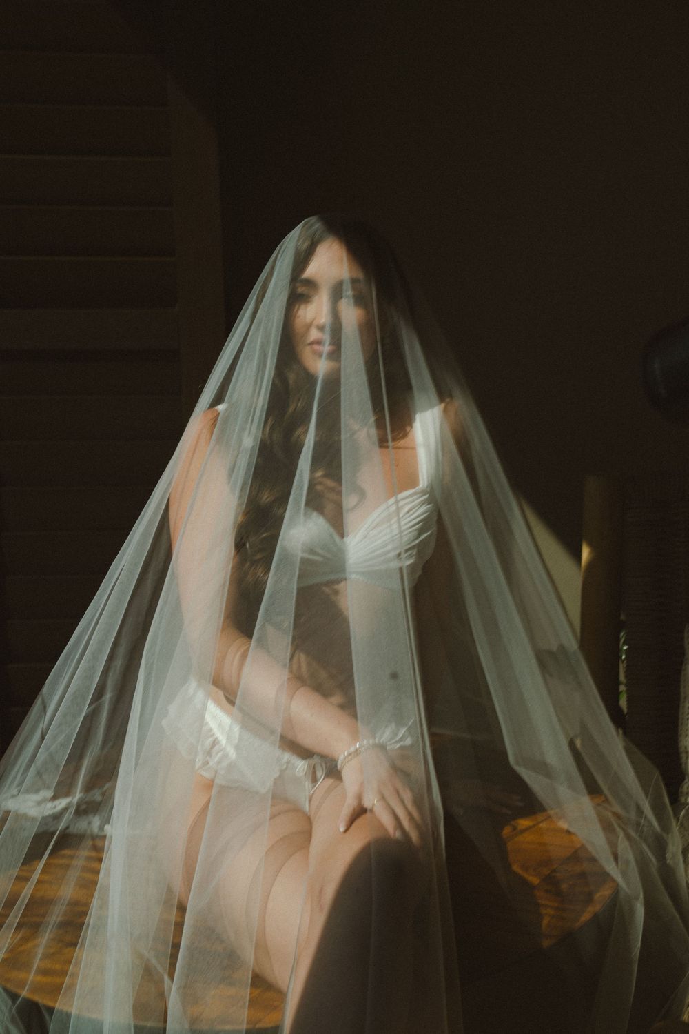 bride getting ready for kauai wedding by Kauai Wedding Photographer
