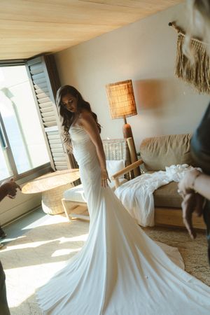 bride getting ready for kauai wedding by Kauai Wedding Photographer