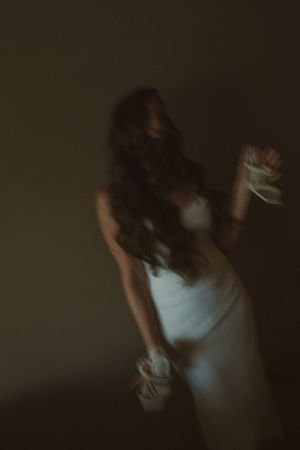 bride getting ready for kauai wedding by Kauai Wedding Photographer