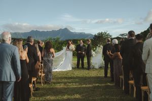 couple reading vows during ceremony at kauai wedding by Kauai Wedding Photographer