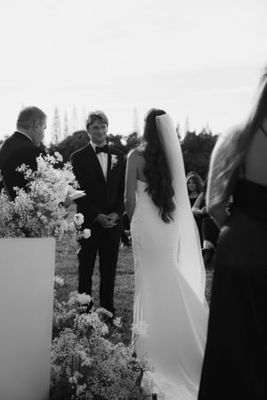 couple reading vows during ceremony at kauai wedding by Kauai Wedding Photographer