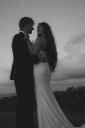 bride and groom posing at sunset at Kauai wedding by Kauai Wedding Photographer