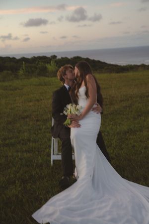 bride and groom kissing at Kauai wedding by Kauai Wedding Photographer
