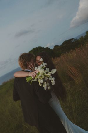 bride and groom kissing at Kauai wedding by Kauai Wedding Photographer