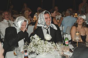 guests laughing during speeches at kauai wedding by Kauai Wedding Photographer