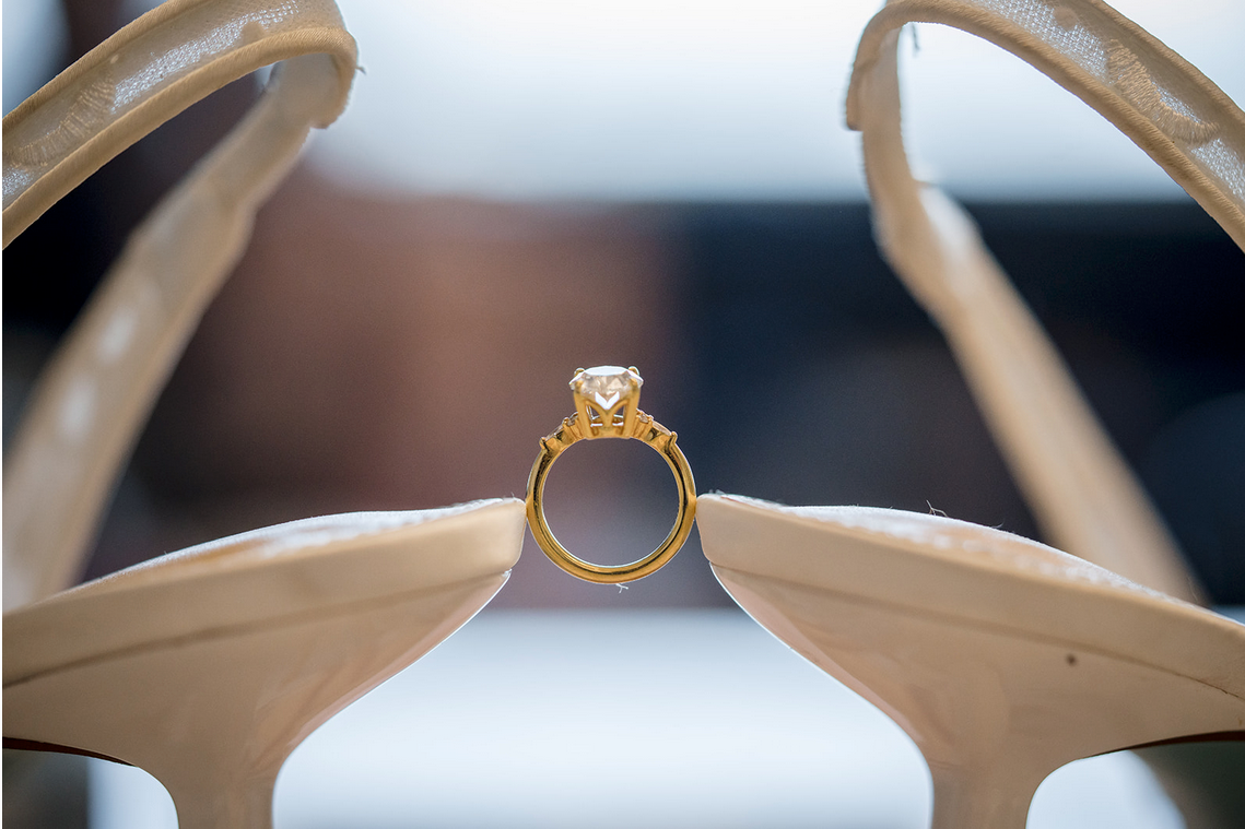 Close-up detail shots of a diamond engagement ring against a neutral background.