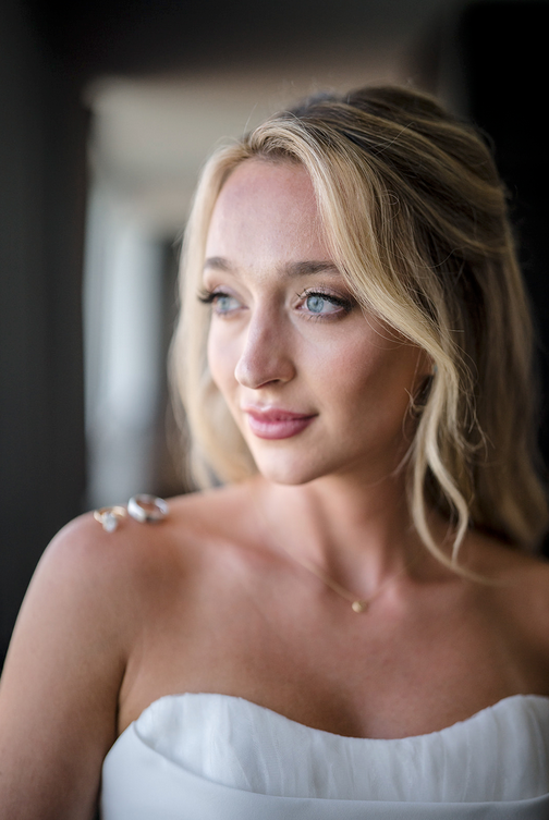 Elegant bridal portraits showing a white strapless dress in soft natural lighting.